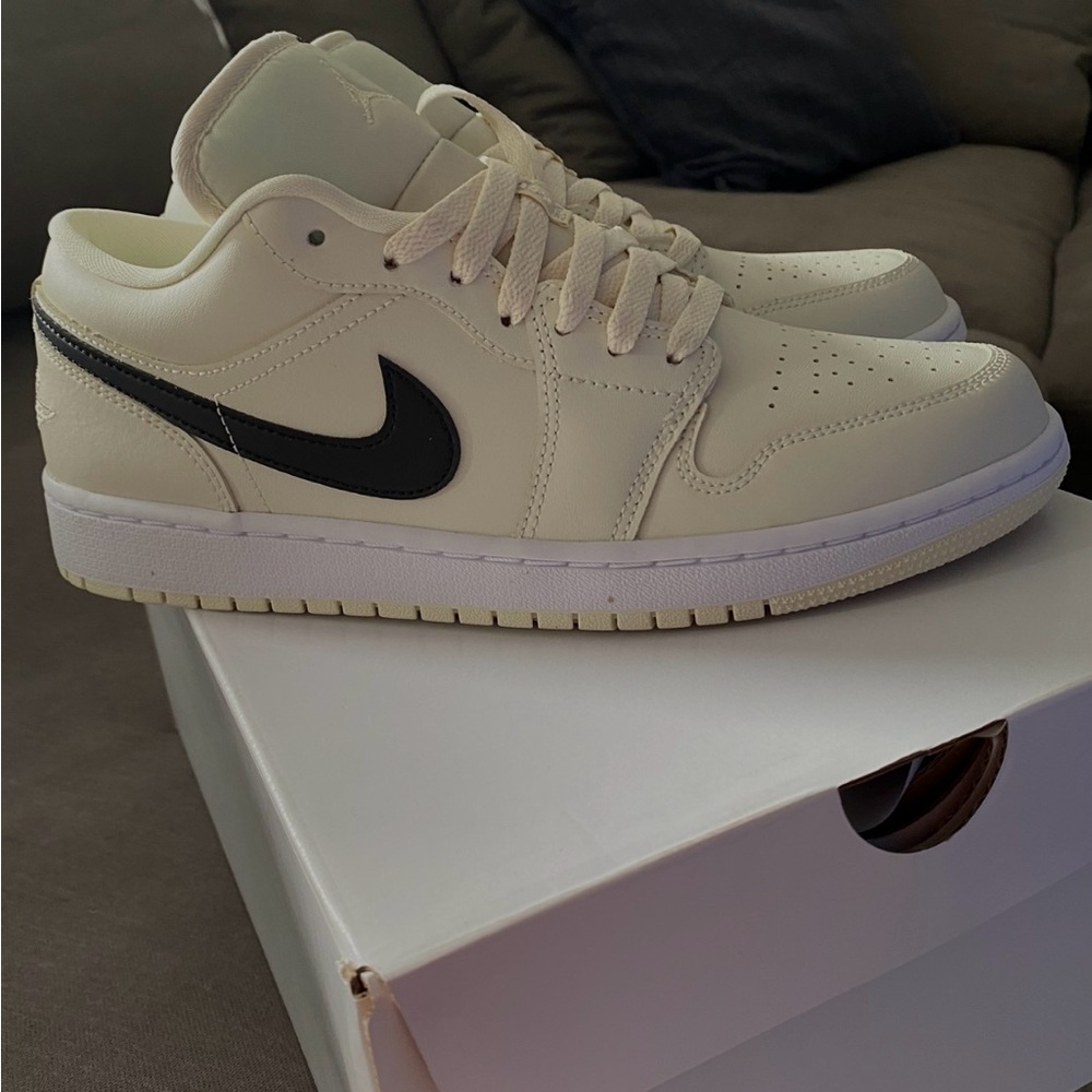 Cream and Black Nike Sneakers